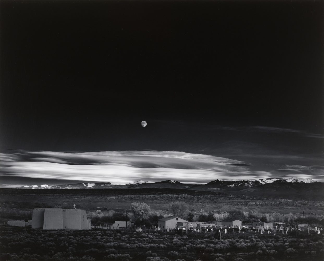 Ansel Adams, Moonrise, Hernandez, NM, 1941, gelatin silver print, 16 x 20 inches, signed in pencil, recto, studio stamp, verso, framed (SOLD)