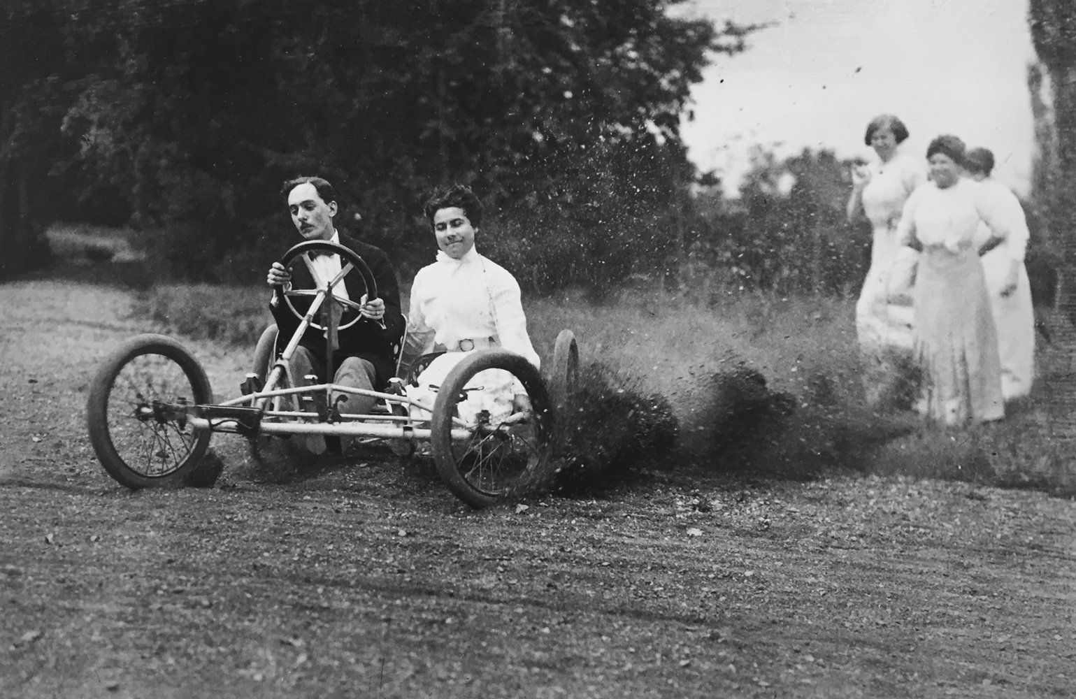 Jacques-Henri Lartigue, Bobsled race – Zissou and Madeleine Thibault in the bobsled, Mme. Folletête,Tatane & Maman Rouzat, September 20, 1911, gelatin silver print, 12 x 16 inches, signed by artist with JHL blind stamp in margin