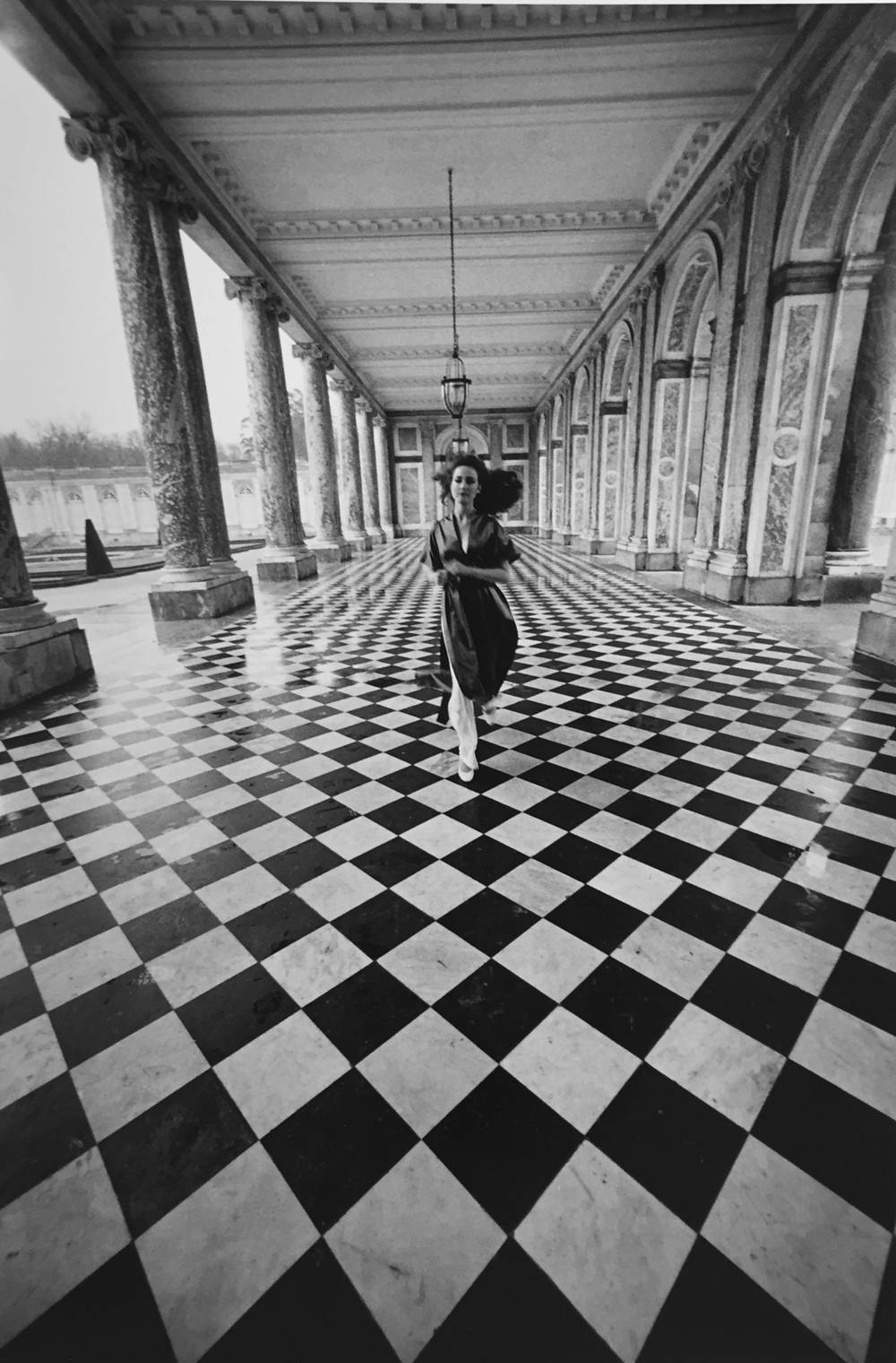 Jacques-Henri Lartigue, Gres gown, Chateau de Versailles, 1980, gelatin silver print, 16 x 12 inches, with JHL blind stamp in margin